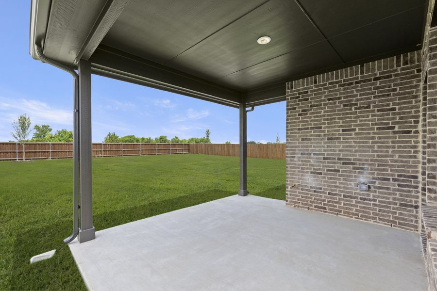 Exterior details and patio area of a home in Lovers Landing, Forney (Image 3). Exterior details and patio area of a home in Lovers Landing, Forney (Image 3).