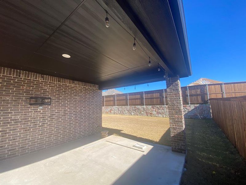 Exterior details and patio area of a home in Creekshaw, Royse City (Image 4).