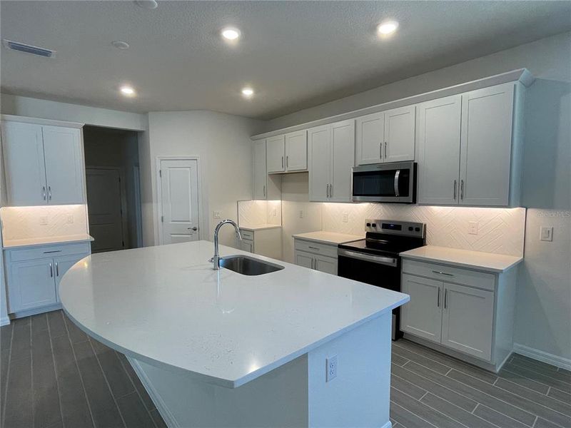 Furnished interior view inside a new home in Angeline, Land O' Lakes (Image 4).