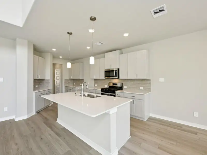 Furnished interior view inside a new home in Stewart's Ranch, Conroe (Image 4).