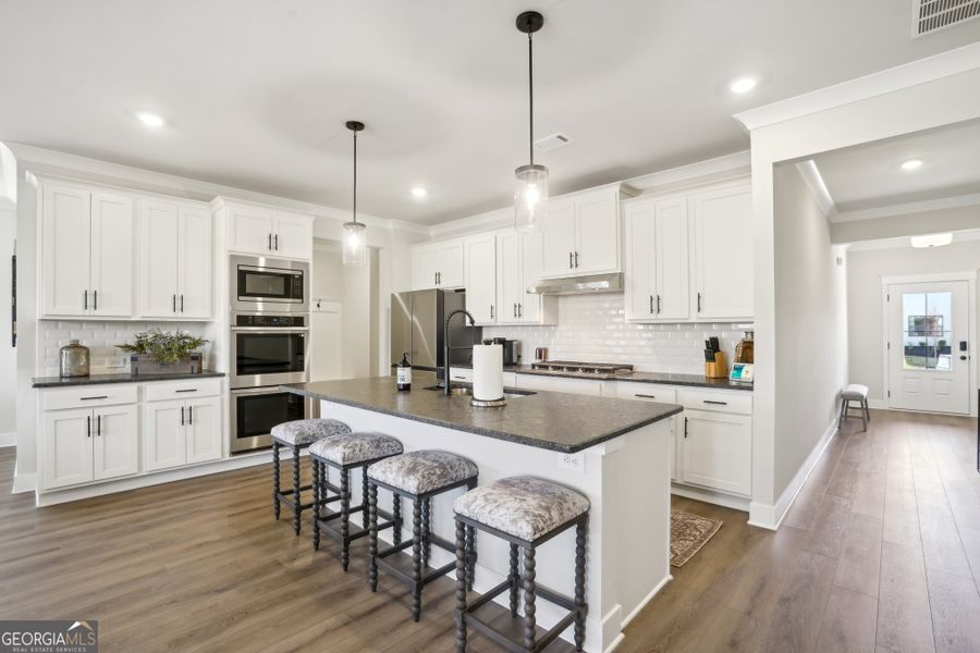 Furnished interior view inside a new home in Ponderosa Farms Reserve, Gainesville (Image 11).