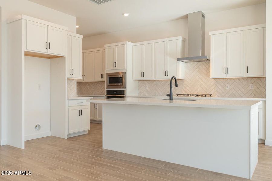 Tri Pointe Soleo 213 - Kitchen-1MLS