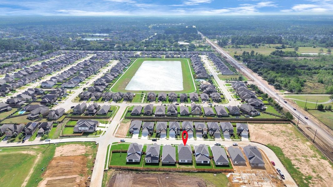 The residence is located just a few streets away from the community lake and a charming picnic area nestled beneath the large beautiful oak trees.