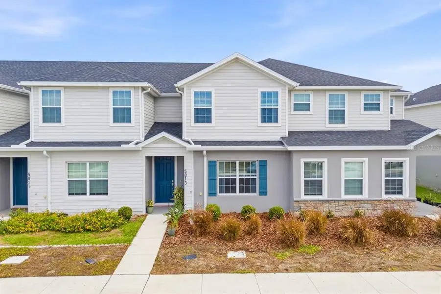 Front exterior of a new home in , St. Cloud, FL, highlighting curb appeal (Image 1). Front exterior of a new home in , St. Cloud, FL, highlighting curb appeal (Image 1).