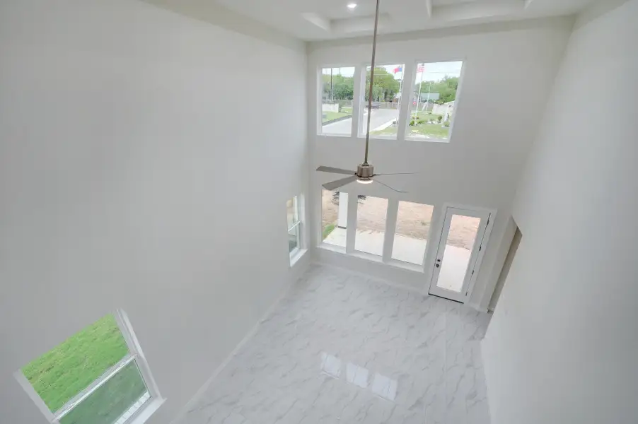 Representative unfurnished interior of a home built from the Travis by Scott Felder Homes in Flora, Hutto (Image 17).