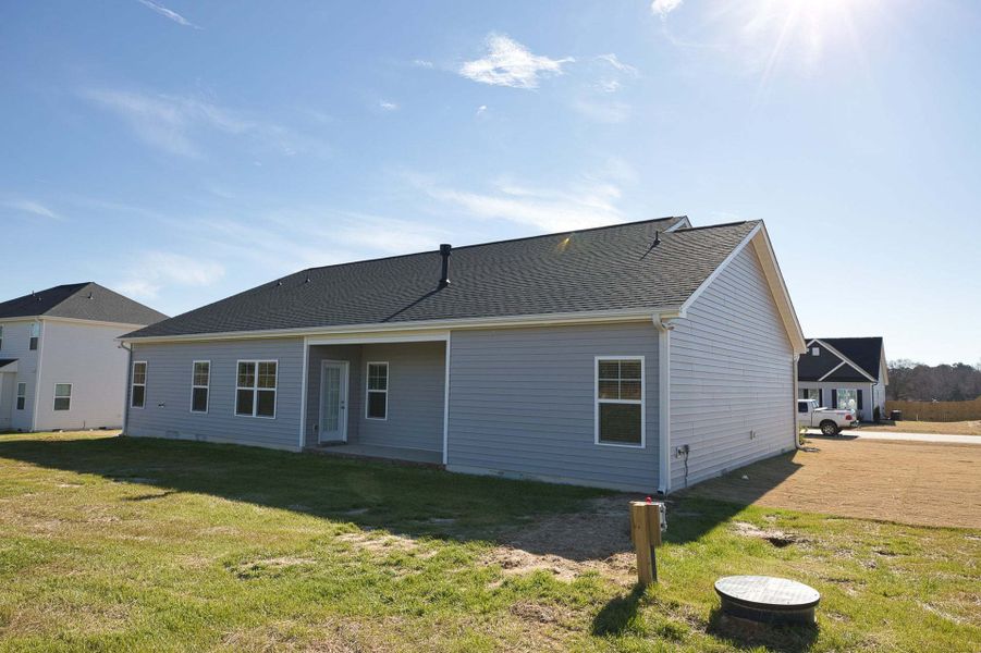 Representative exterior photo of a completed home built from the Carver by Caviness & Cates Communities in Maggie Way, Wendell, NC (Image 147).