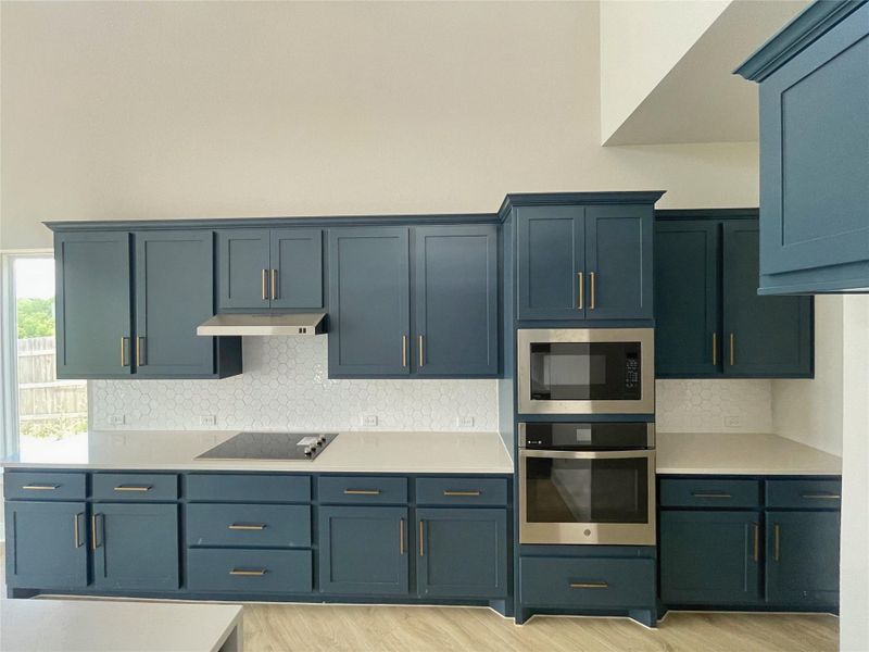 Clean lines and ample cabinetry define this contemporary kitchen space. Clean lines and ample cabinetry define this contemporary kitchen space.