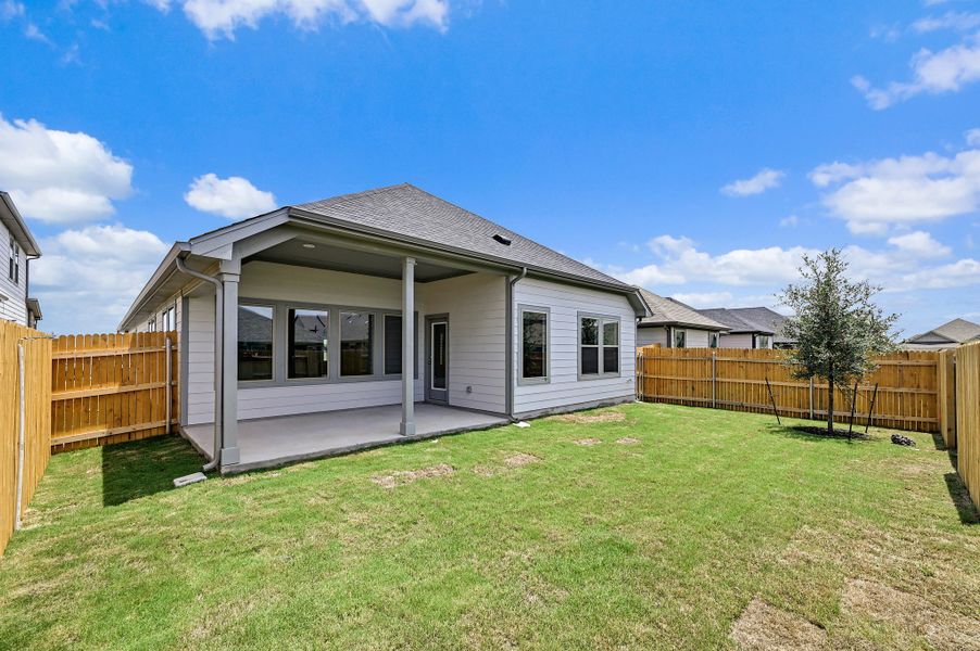 Exterior details and patio area of a home in Prairie Winds, Hutto (Image 23).