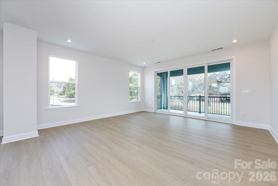 Living Room with Large Sliding Glass Doors to Outdoor Living