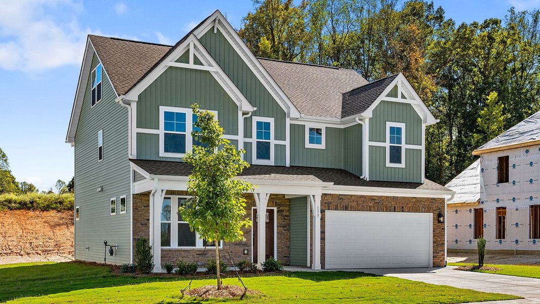 Front exterior of a new home in Fieldstone, Lexington, NC, highlighting curb appeal (Image 2).