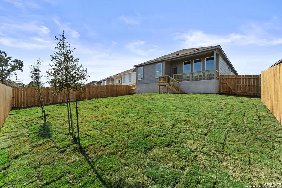 Exterior details and patio area of a home in Waterwheel: Coastline Collection, San Antonio (Image 2).