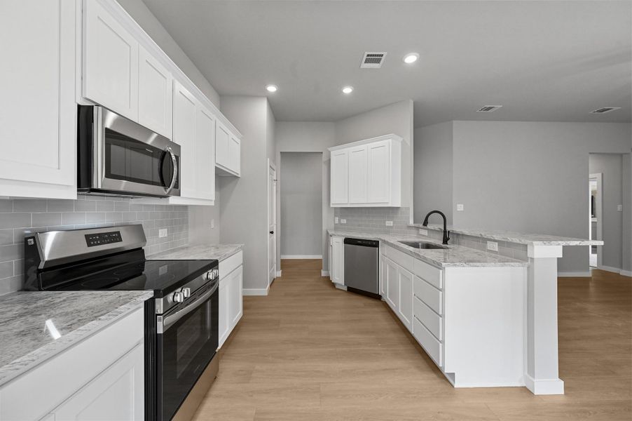 Representative furnished interior of a home built from the Hanover by Cheldan Homes in Craftsmen's Corner, Cleburne (Image 12).