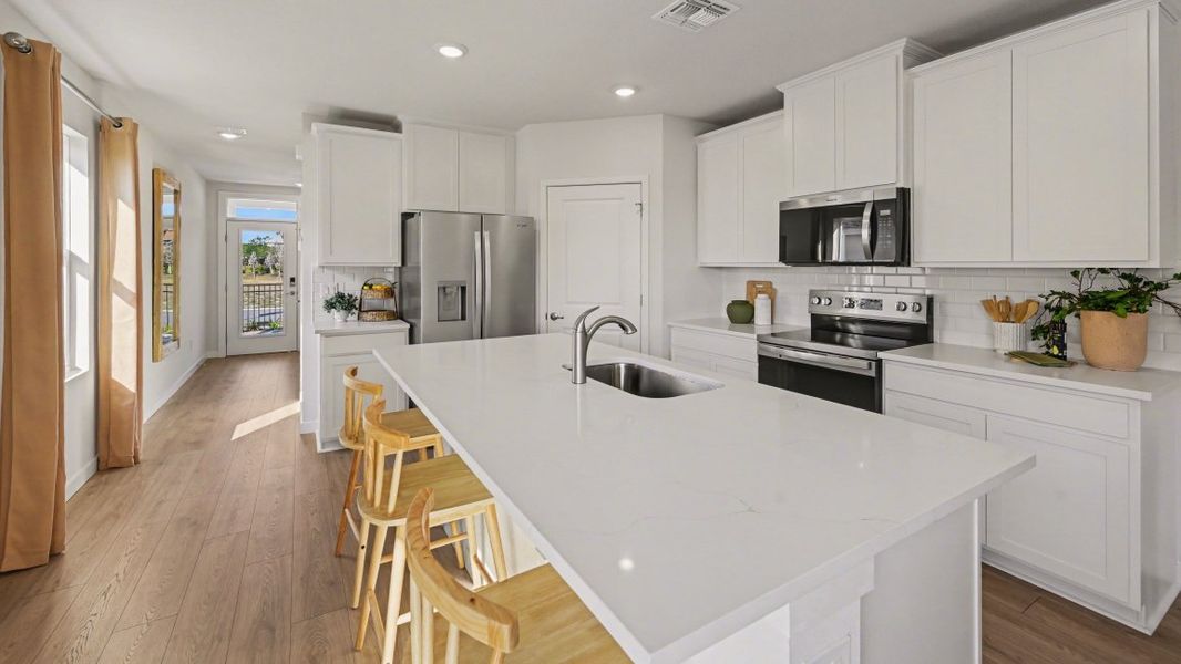 Representative furnished interior of a home built from the Harper by D.R. Horton in Bentley Crossing - Express & Tradition, Fort Myers (Image 11).