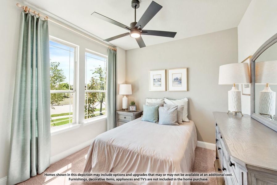 Bedroom with ceiling fan, large windows with green curtains, and dresser with mirror Bedroom with ceiling fan, large windows with green curtains, and dresser with mirror