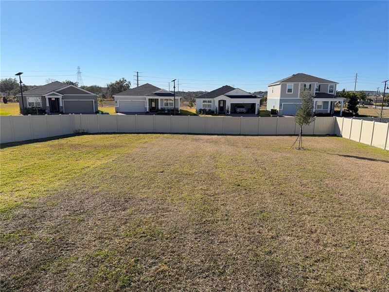 Exterior details and patio area of a home in Waterbrooke, Clermont (Image 4).