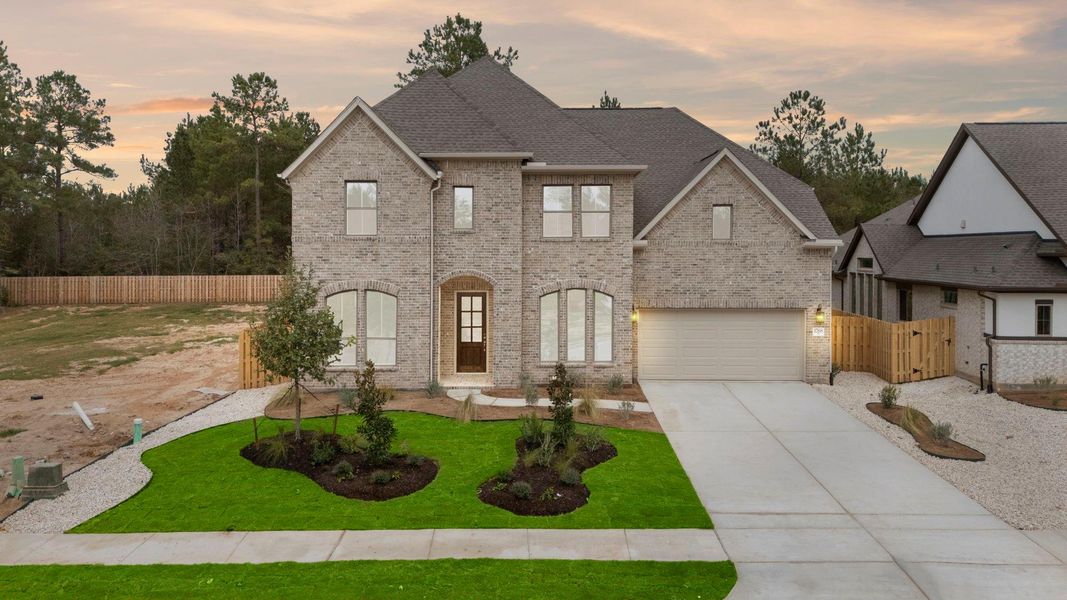 Front exterior of a new home in Colton, Todd Mission, TX, highlighting curb appeal (Image 2). Front exterior of a new home in Colton, Todd Mission, TX, highlighting curb appeal (Image 2).