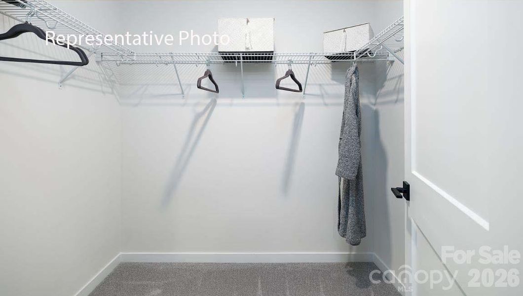 Spacious, unfurnished interior of a new home in Sanctuary at Southgate, Indian Trail (Image 19).