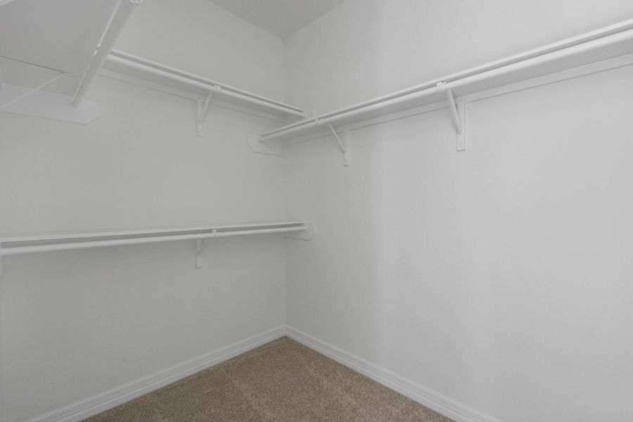 A view of your large primary walk-in Closet