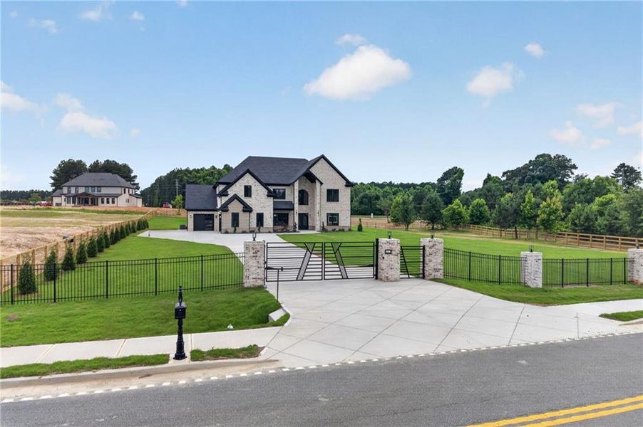 Front exterior of a new home in , Dacula, GA, highlighting curb appeal (Image 25). Front exterior of a new home in , Dacula, GA, highlighting curb appeal (Image 25).