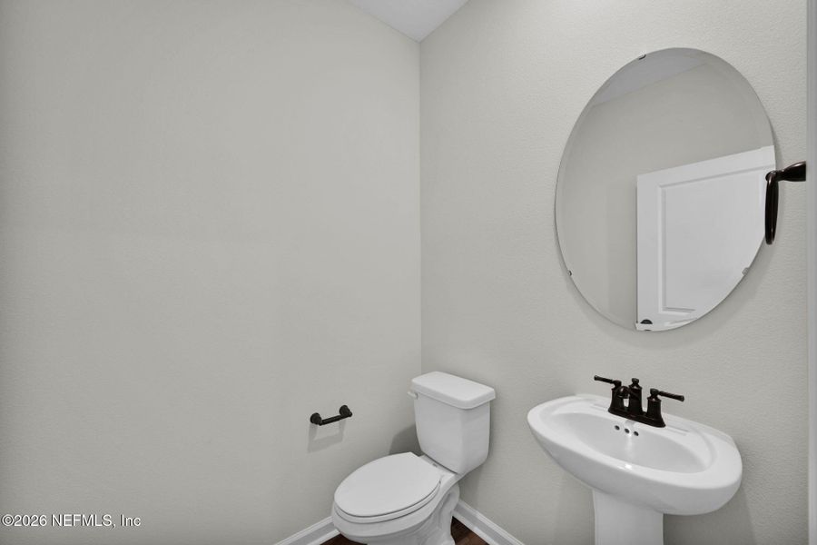 Furnished interior view inside a new home in Baxley Villas, Middleburg (Image 6).