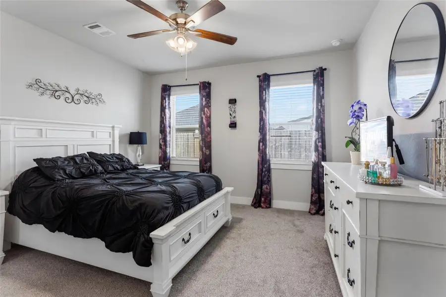 Spacious and inviting primary bedroom featuring ample natural light, and a tranquil atmosphere for ultimate relaxation. Spacious and inviting primary bedroom featuring ample natural light, and a tranquil atmosphere for ultimate relaxation.