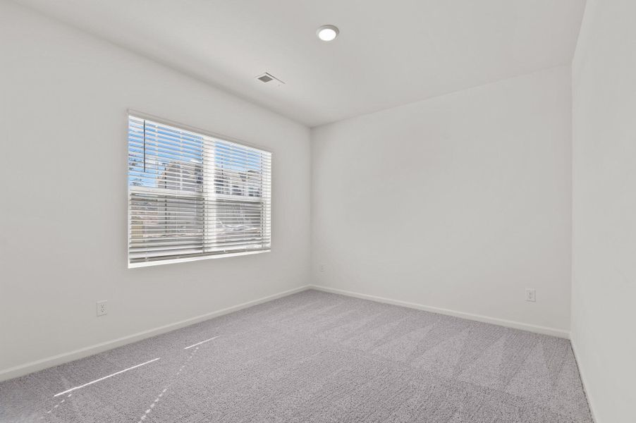 Representative unfurnished interior of a home built from the Solstice by Starlight Homes in Noble Ridge, Howe (Image 26).