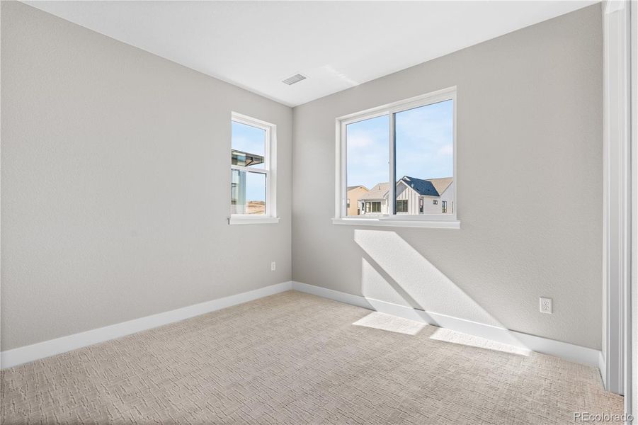 Spacious, unfurnished interior of a new home in Legends at Lyric, Lone Tree (Image 28).