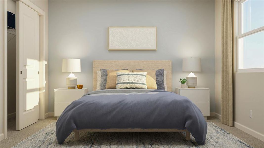 Bedroom featuring light colored carpet and baseboards Bedroom featuring light colored carpet and baseboards