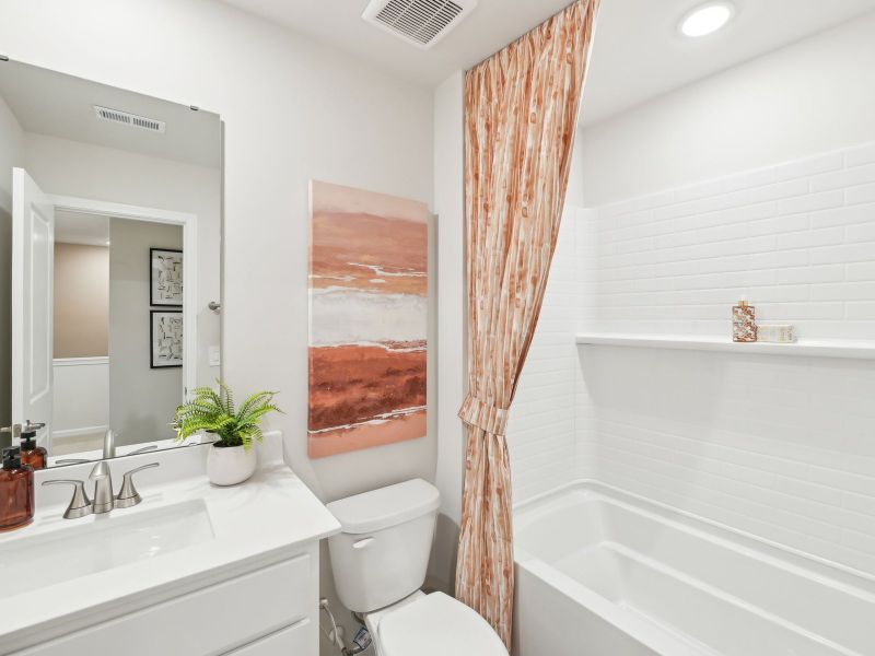 Secondary bathroom in the Topaz floorplan at a Meritage Homes community in Mebane, NC.