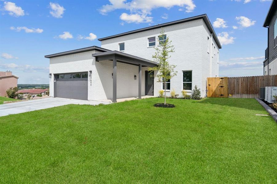 Exterior details and patio area of a home in Hills of Lake Country, Fort Worth (Image 3).