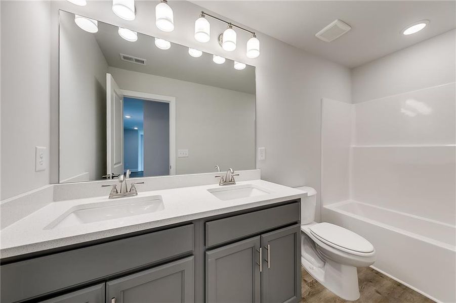 Furnished interior view inside a new home in , Homer (Image 4). Furnished interior view inside a new home in , Homer (Image 4).