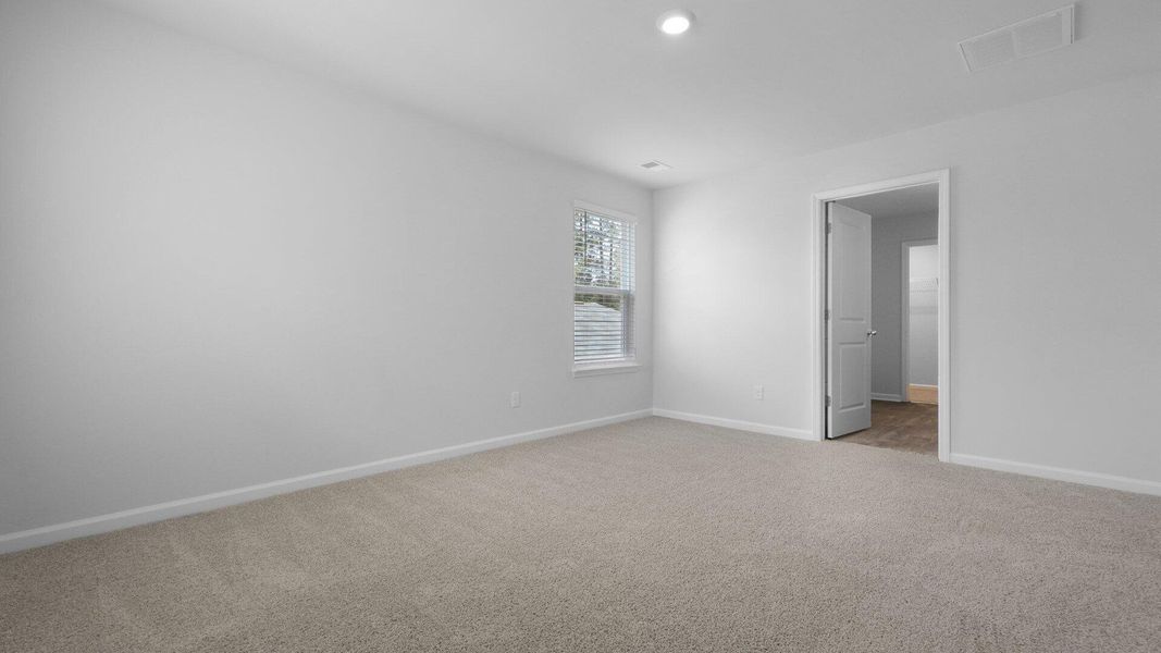 Spacious, unfurnished interior of a new home in Pine Hills at Cane Bay, Summerville (Image 31).