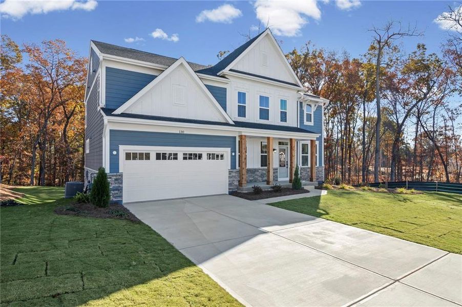Front exterior of a new home in Pickens Bluff, Hiram, GA, highlighting curb appeal (Image 22).