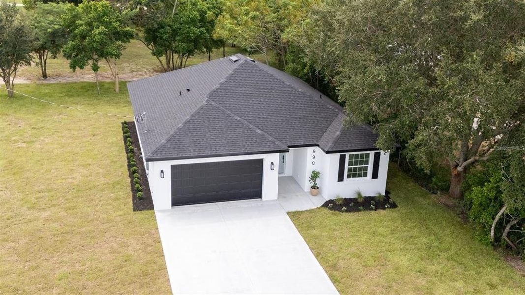 Front exterior of a new home in , Eagle Lake, FL, highlighting curb appeal (Image 29). Front exterior of a new home in , Eagle Lake, FL, highlighting curb appeal (Image 29).