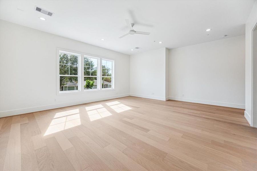 A unique downstairs game room, which can also serve as a secondary primary bedroom, is situated above the garage—making it an ideal hangout space for teens, adults, and little ones alike. This versatile room is prewired for surround sound, includes a spacious closet, and offers convenient access to a full bathroom Photo as of 11/5/2024