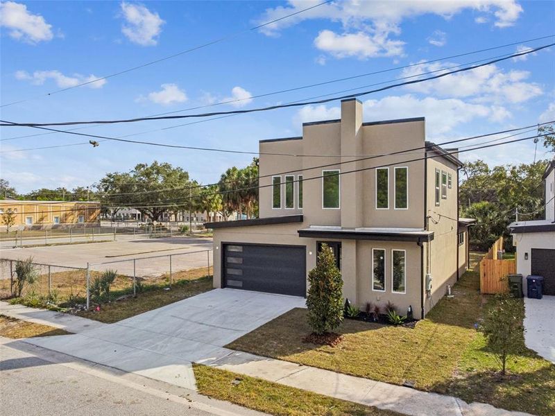 Front exterior of a new home in , Tampa, FL, highlighting curb appeal (Image 37).
