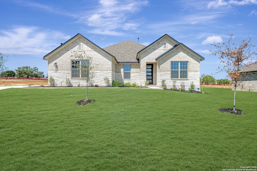 Front exterior of a new home in Preserve at Annabelle Ranch, San Antonio, TX, highlighting curb appeal (Image 15).