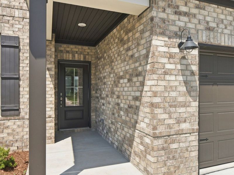Exterior details and patio area of a home in Woods Crossing, Gallatin (Image 3). Exterior details and patio area of a home in Woods Crossing, Gallatin (Image 3).
