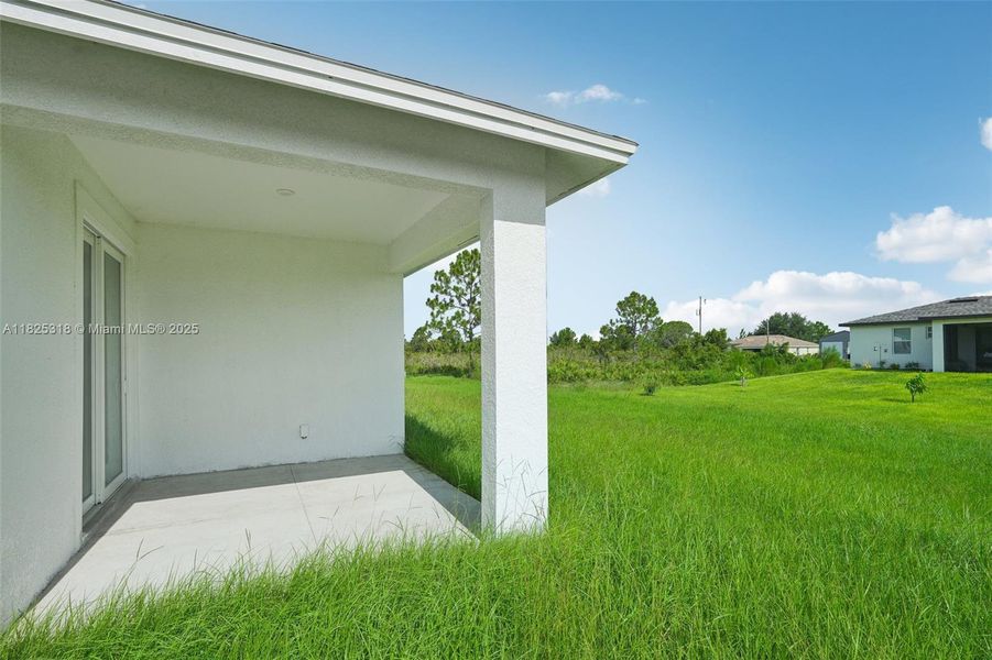 Exterior details and patio area of a home in , Lehigh Acres (Image 24). Exterior details and patio area of a home in , Lehigh Acres (Image 24).