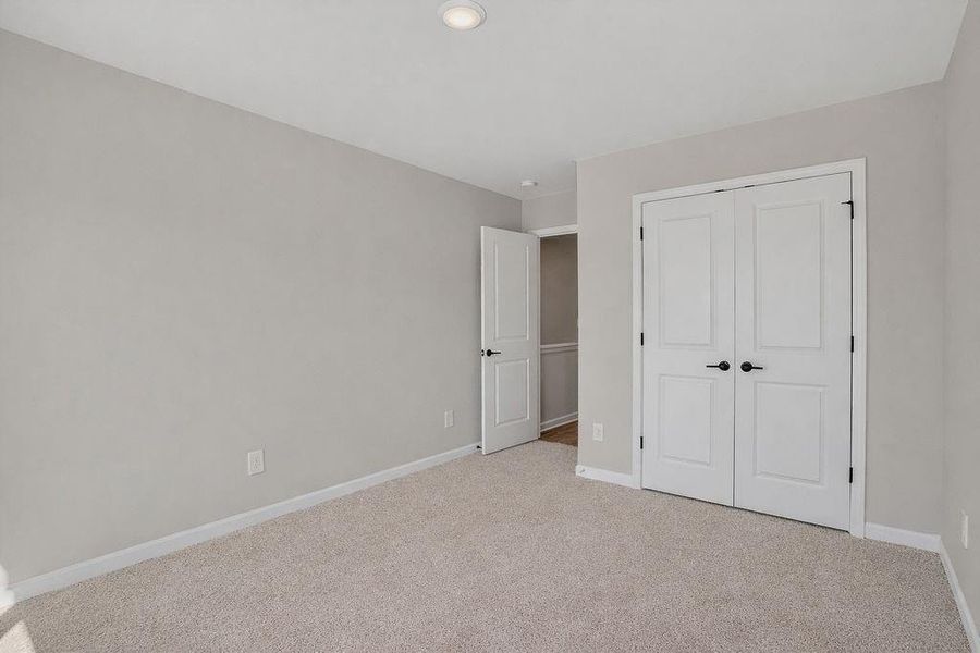Spacious, unfurnished interior of a new home in Chimney Oaks Overlook, Homer (Image 16).