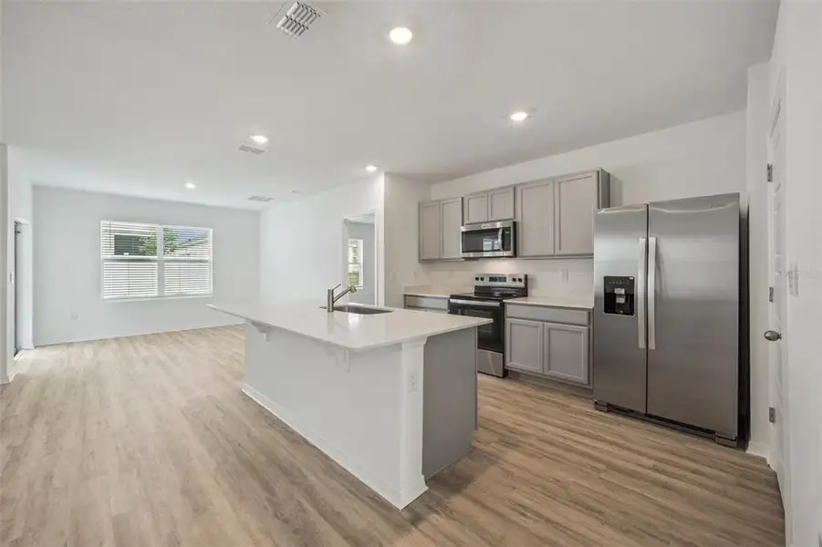 Furnished interior view inside a new home in , Tavares (Image 5).