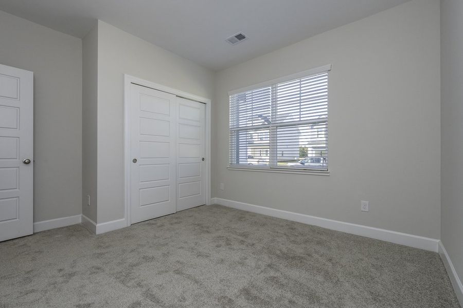 Representative unfurnished interior of a home built from the The Hunter by Cothran Homes in Holly Ridge, Greenville (Image 17).