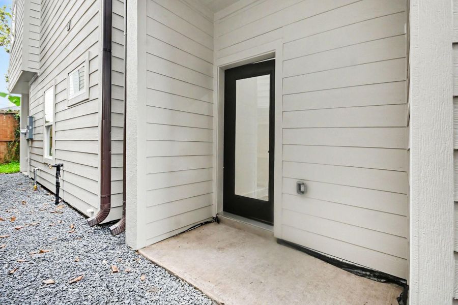 Exterior details and patio area of a home in , Houston (Image 4).