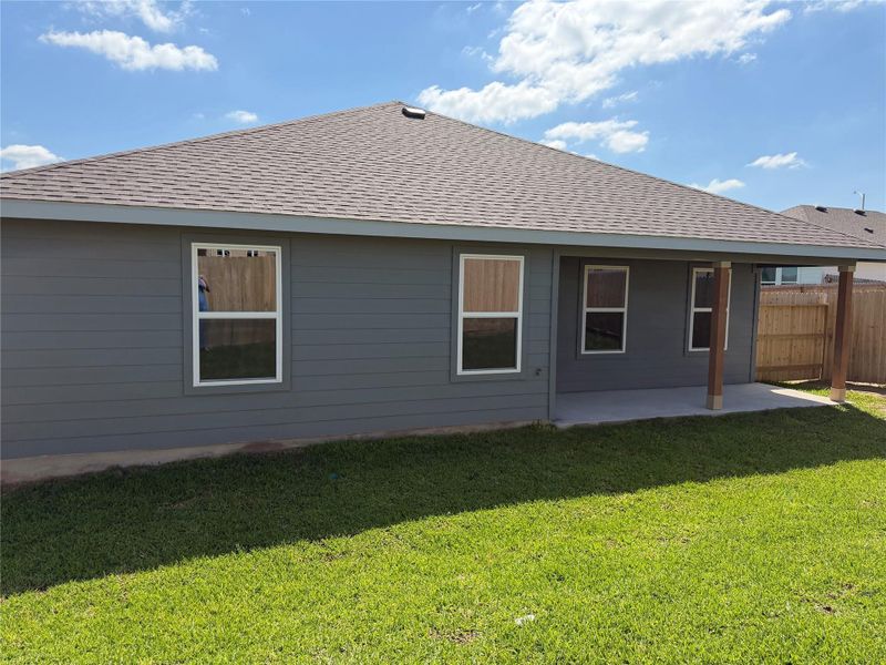 Exterior details and patio area of a home in Liberty Village, Brenham (Image 3).