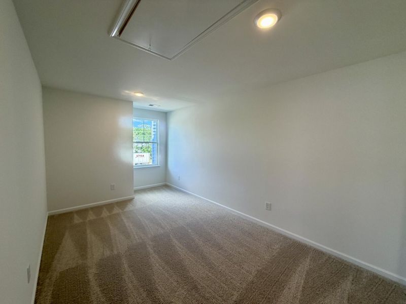 Spacious, unfurnished interior of a new home in Bellevue Townhomes, Greenville (Image 15).