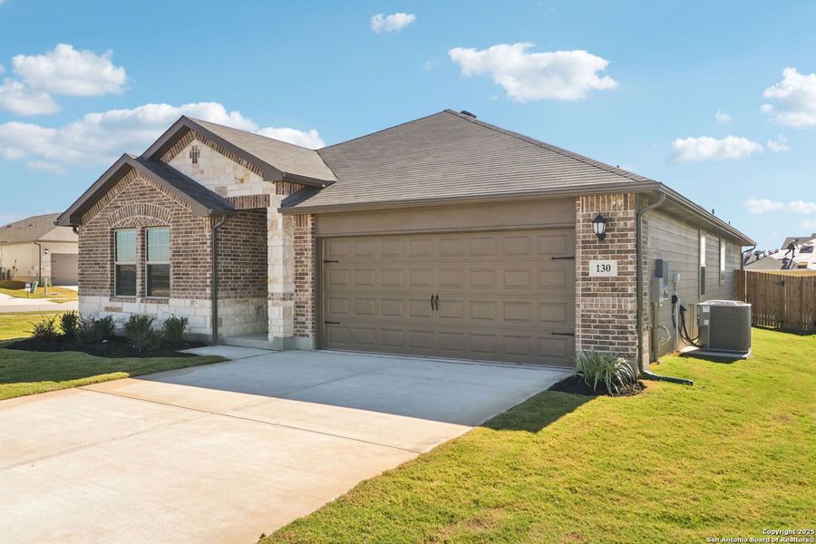 Exterior details and patio area of a home in Legendary Trails - Classic Series, Cibolo (Image 28).