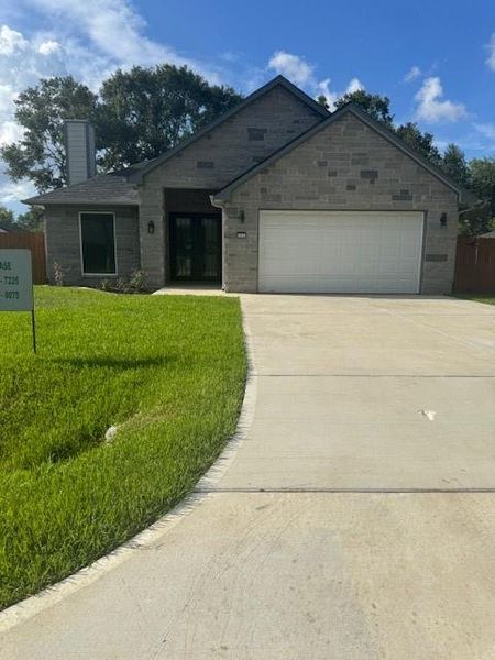 Front exterior of a new home in , League City, TX, highlighting curb appeal (Image 2). Front exterior of a new home in , League City, TX, highlighting curb appeal (Image 2).