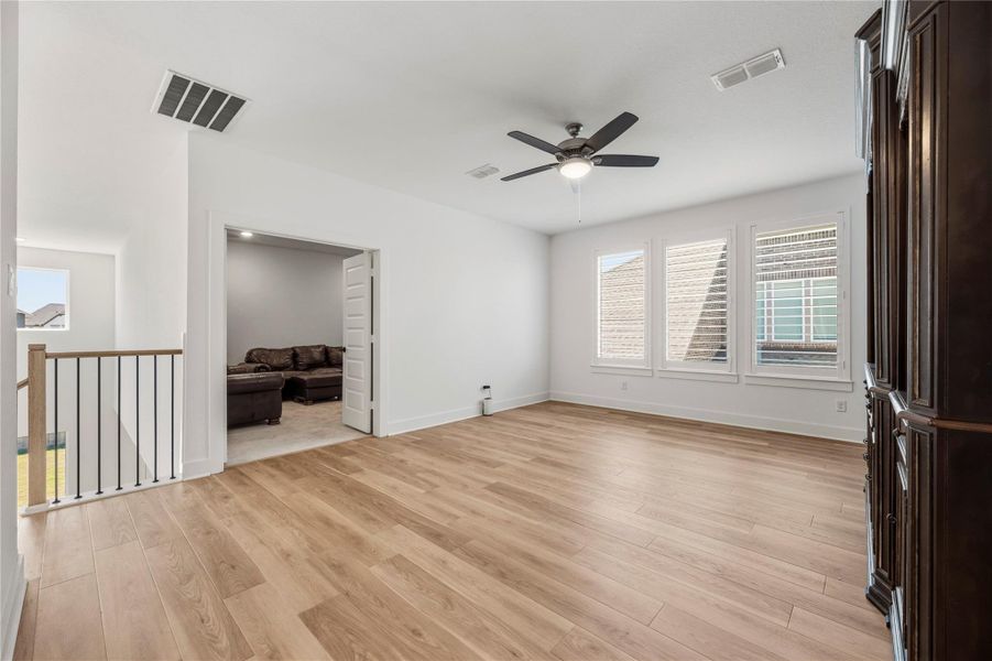 Spacious, unfurnished interior of a new home in Bridgeland, Cypress (Image 21).