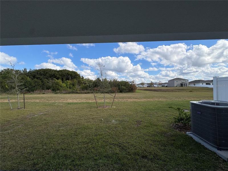 Exterior details and patio area of a home in Sky Lakes Towns, St. Cloud (Image 2).