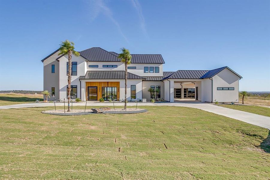 Front exterior of a new home in , Weatherford, TX, highlighting curb appeal (Image 1).